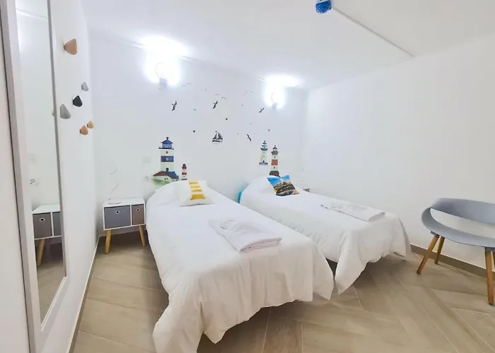 ゲストハウス Quartos Grupos