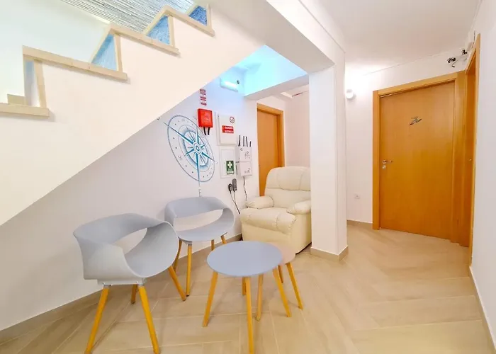 Quartos Grupos ゲストハウス