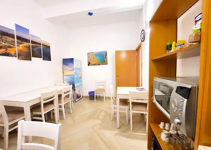 ゲストハウス Quartos Grupos