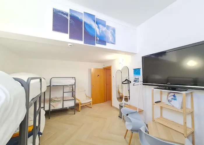 ゲストハウス Quartos Grupos