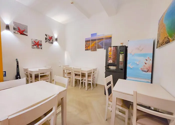 ゲストハウス Quartos Grupos *