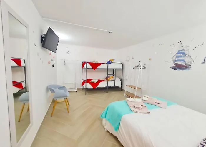 Quartos Grupos Гостевой дом